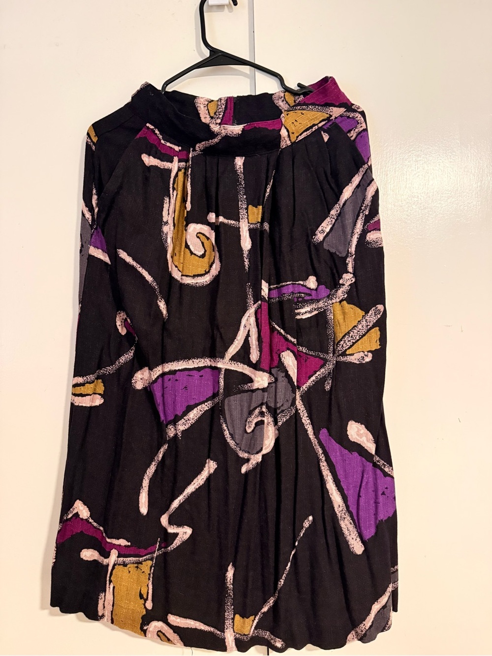 B. Smart Black Midi Skirt with Purple and Mustard Abstract Print Norton & Compan